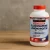Kirkland Signature Extra Strength Glucosamine & Chondroitin supplement bottle on wooden surface