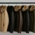 Five Rudsak Canada winter coats on a rack with fur-trimmed hoods